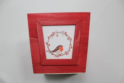 Red square wooden planter with robin