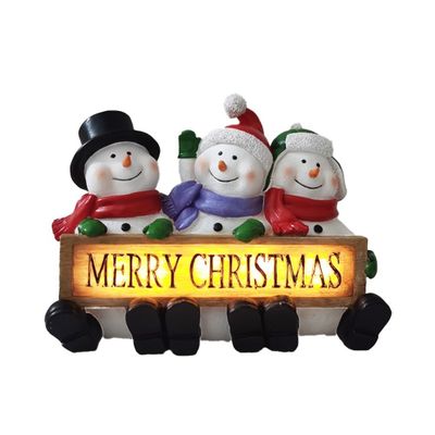 3 snowmen with light up Merry Christmas sign 24cm