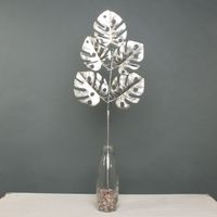 Metallic monstera leaf spray champagne