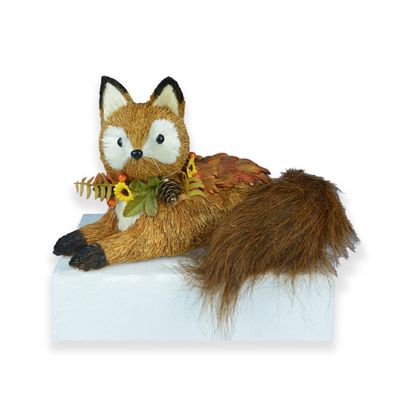 Fox lying down with acorns 29x20x18cm